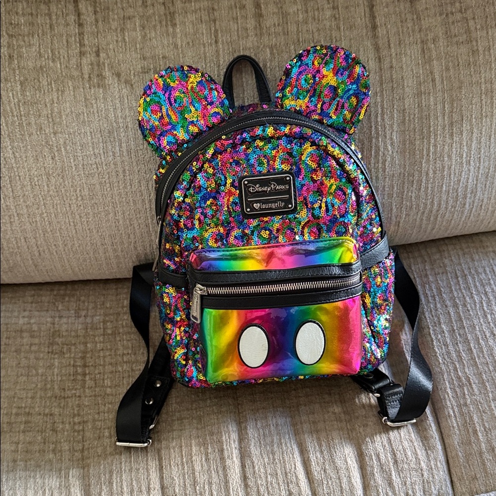 Disney lounge fly Multicolor Sequin retired backpack APX 11 x 8 gently used